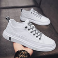 Men's casual white PU flat shoes with round toe and low heel slip-on design