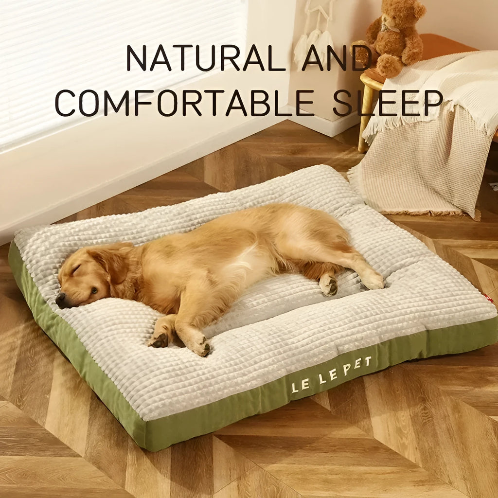 Soft fleece dog bed with a detachable blanket in green, shown in an XL size.
