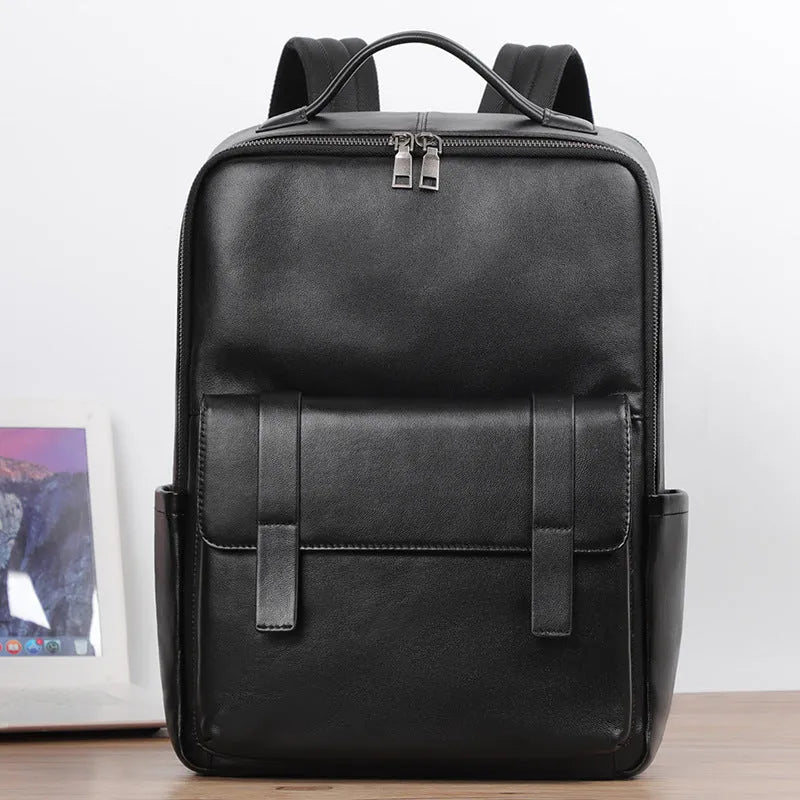 Black genuine leather computer backpack with 36-55 litre capacity and physiological curve back plate