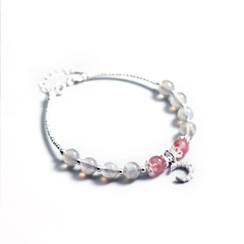 Handmade adjustable moonstone bracelet with 6mm stone and crescent moon charm on silver chain