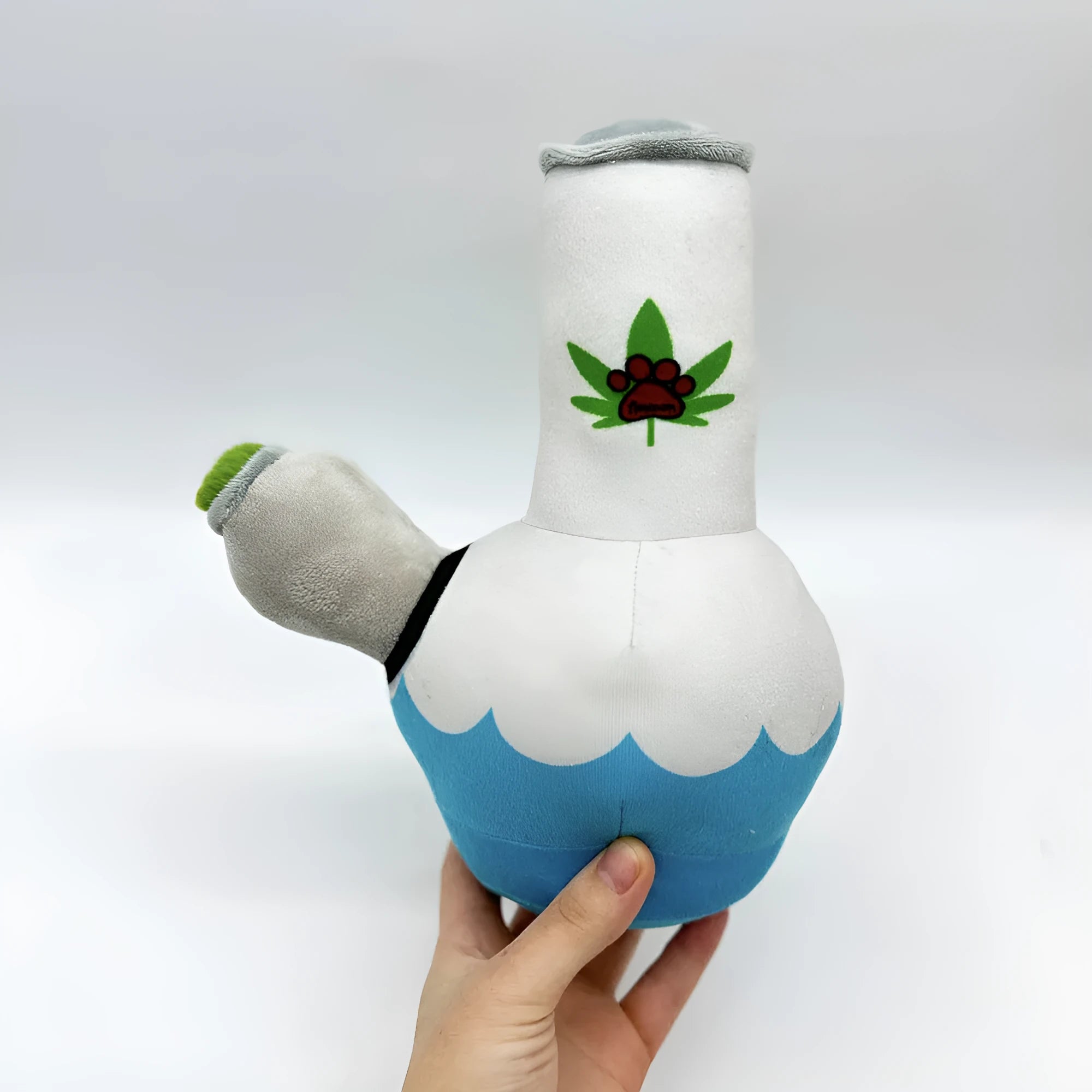Kettle-shaped plush dog toy with squeaker, measuring 24cm with printed pattern design