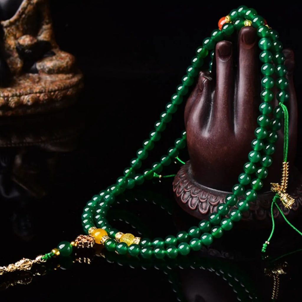 Natural green agate multi-circle bracelet for men and women on a wrist, showing different bead size options.
