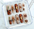 Nail painting kit containing nail patches, jelly glue, and a rubbing strip in colour SGJ-A2-0026.