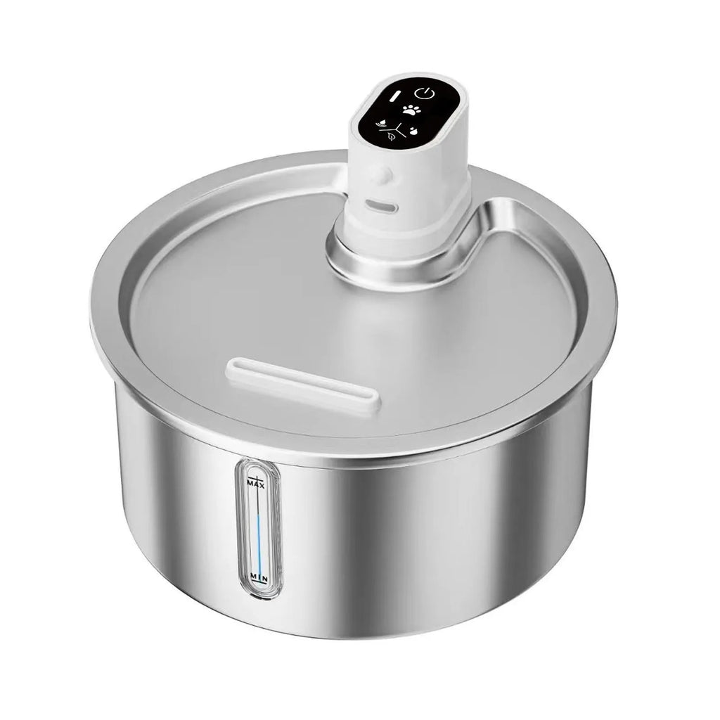 White stainless steel cat water fountain with constant temperature heating base on a table.
