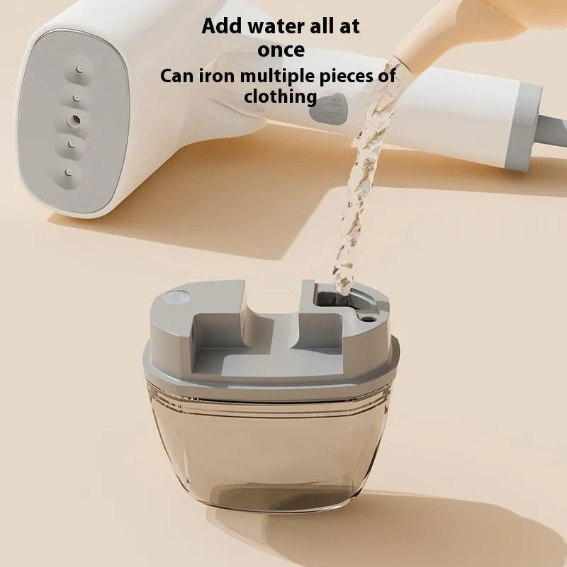 Blue handheld garment steamer with water tank and mechanical controls for clothing care