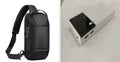 Black 20000mAh portable power bank with USB charging cable on a white background.