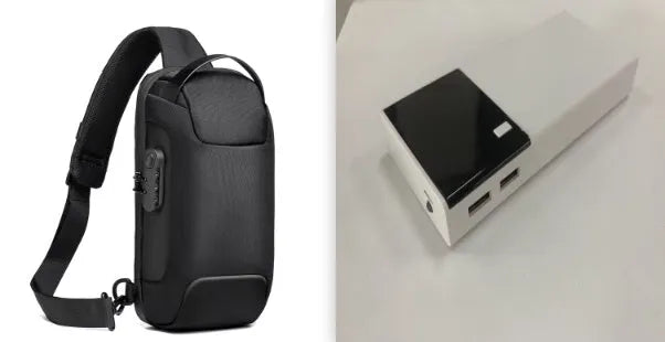 Black 20000mAh portable power bank with USB charging cable on a white background.