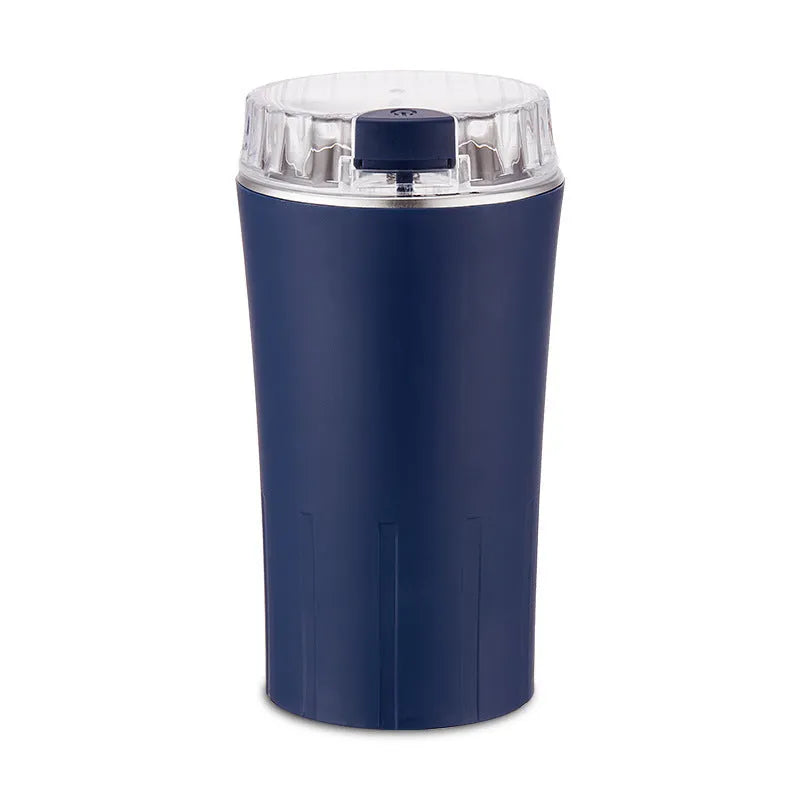Blue mini flour mill and grinder machine made from stainless steel with adjustment dial.