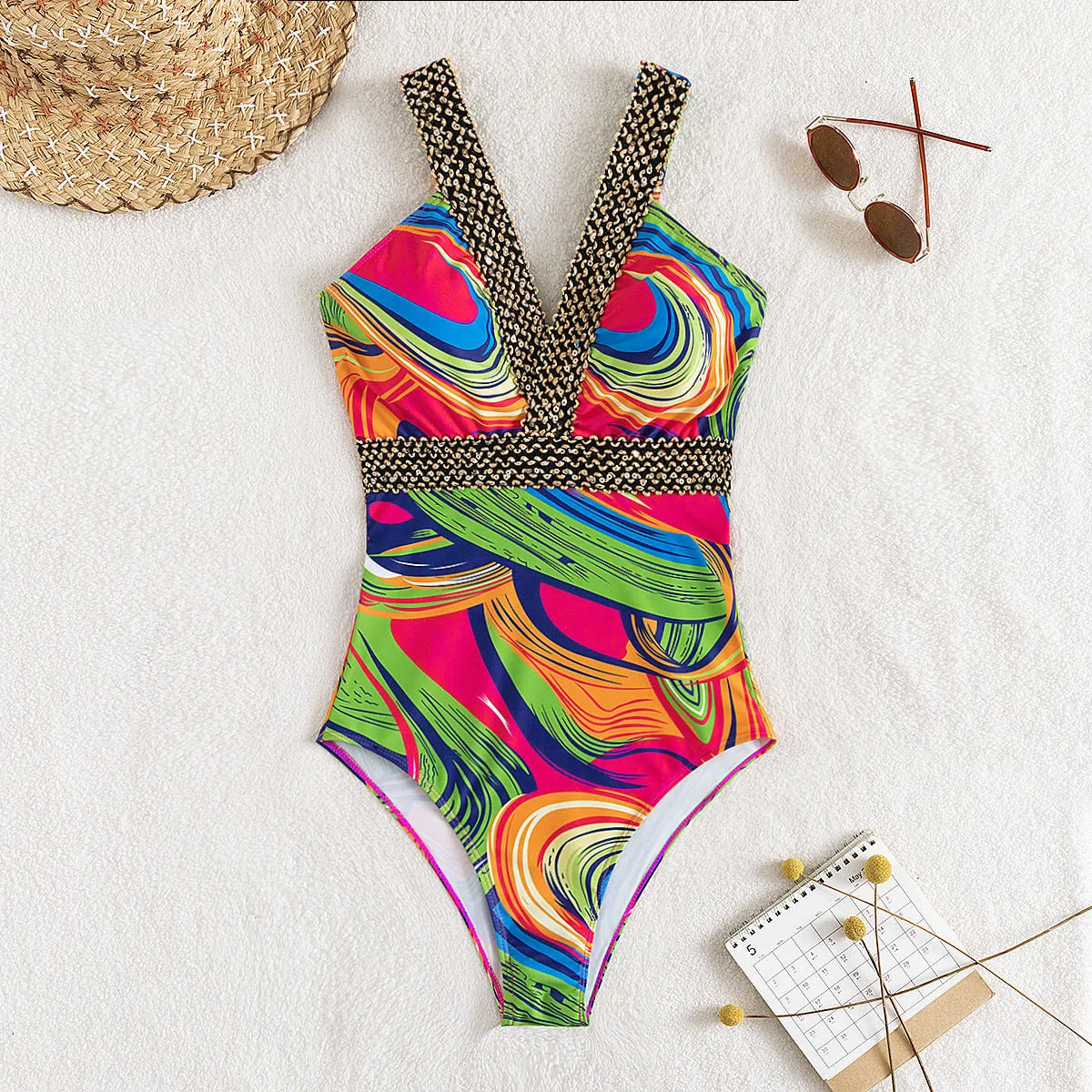 Women's deep V neck one-piece swimsuit with spaghetti straps on a hanger
