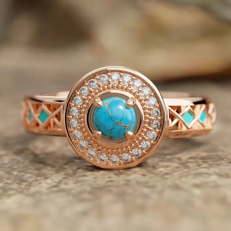 Rose gold copper women's ring with turquoise geometric design and micro inlaid zircon stones.