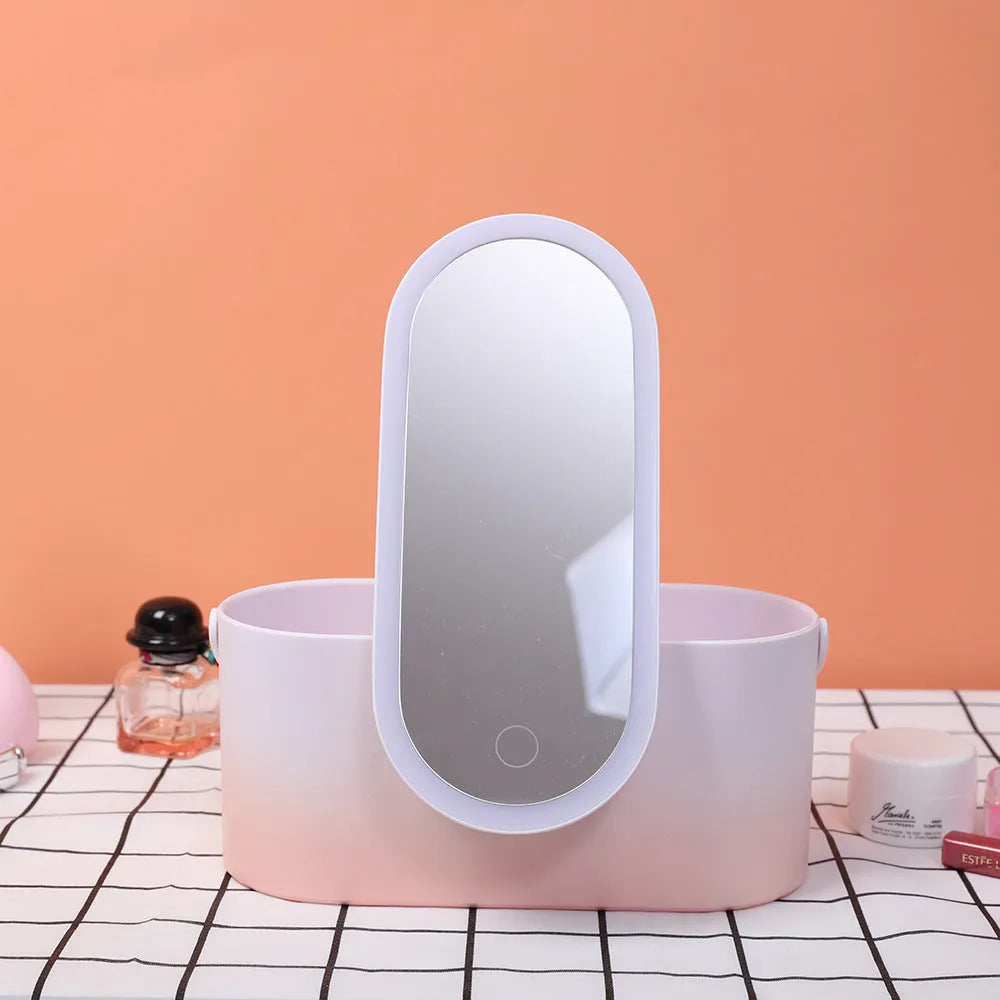 Pink gradient LED makeup mirror storage box with open compartments showing mirror and storage space