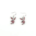 A pair of sparkling rabbit-shaped stud earrings with a full pavé cubic zirconia setting on a silver metal background.