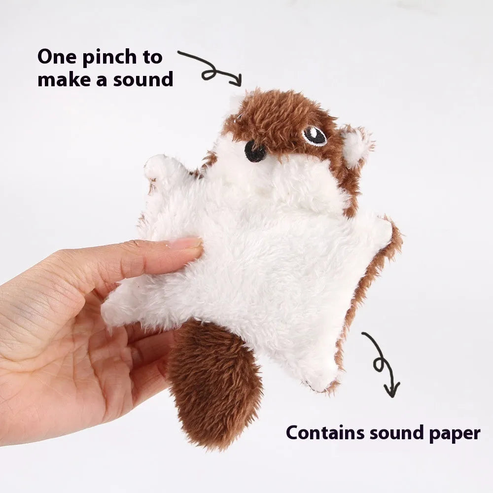 Plush flying squirrel cat teaser toy in brown and grey with ringing paper sound, on a plain background