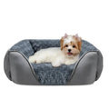Beige faux fur dog bed with raised stuffed sides and a removable cover, shown in a large size.
