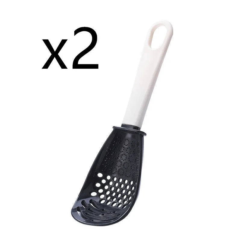 Red and black plastic multifunctional slotted cooking spoon with serrated edges for mashing and grinding.