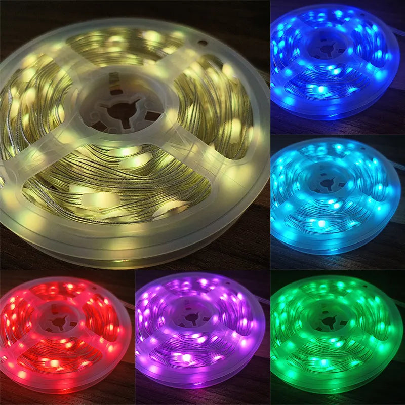 Long 10-metre multi-colour LED party light string with 100 lights coiled on a reel.