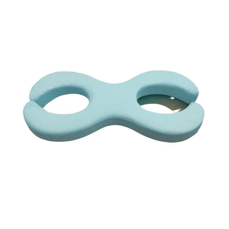 Blue cylindrical memory foam cervical traction pillow for neck support.