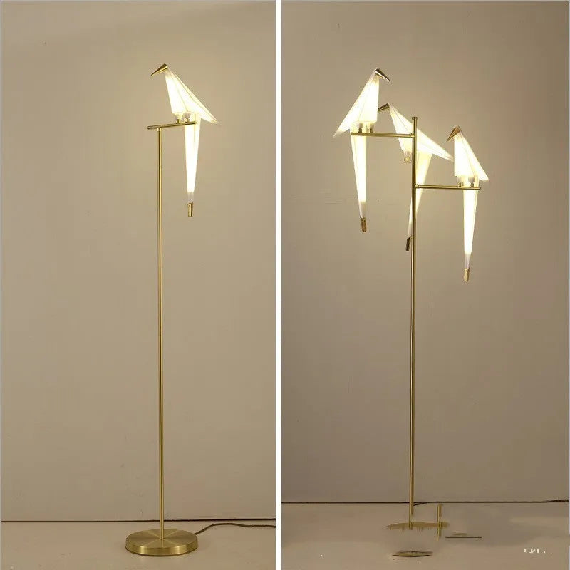 Paper crane lamp with iron lampshade, warm light, bird desk lamp on table.