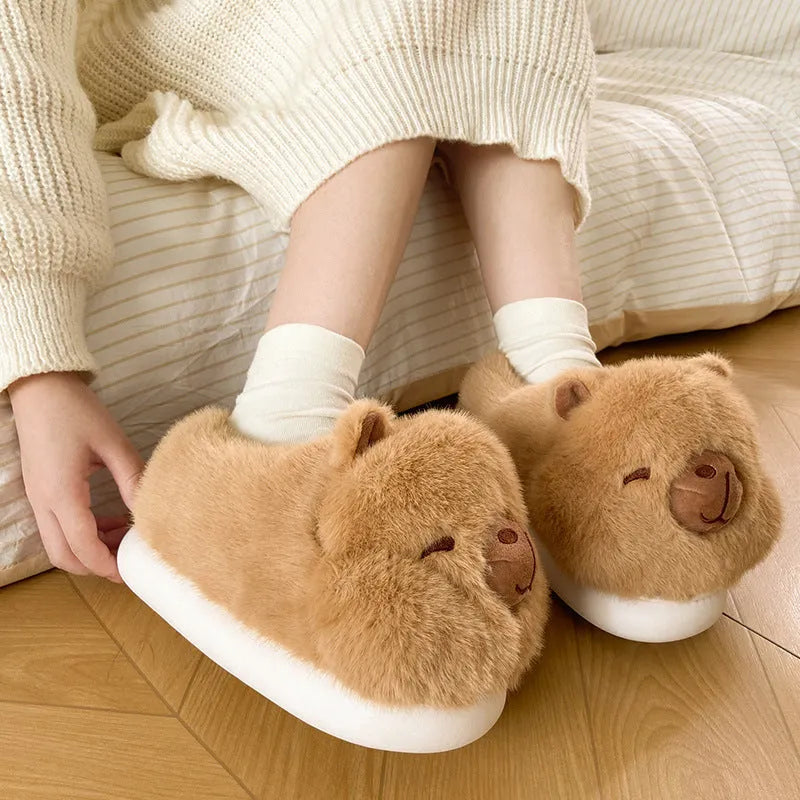 Women's light brown winter slippers with plush upper, artificial wool lining, and cartoon pattern in UK sizes 36-41