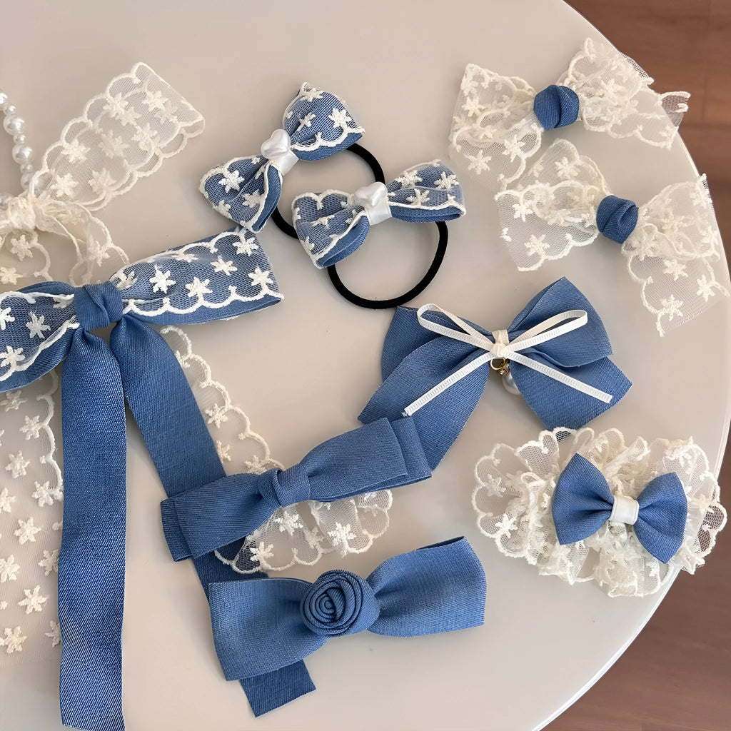 Handmade pastoral style cloth hair barrette with lace and bow decoration on a plastic hairpin.