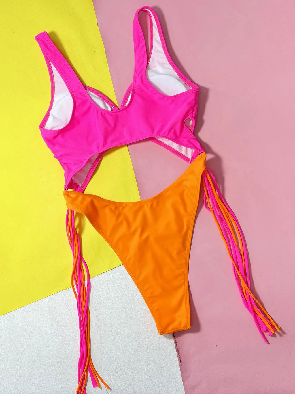 Women's one-piece hollow-out steel ring tassel swimsuit in rose red for swimming and wading