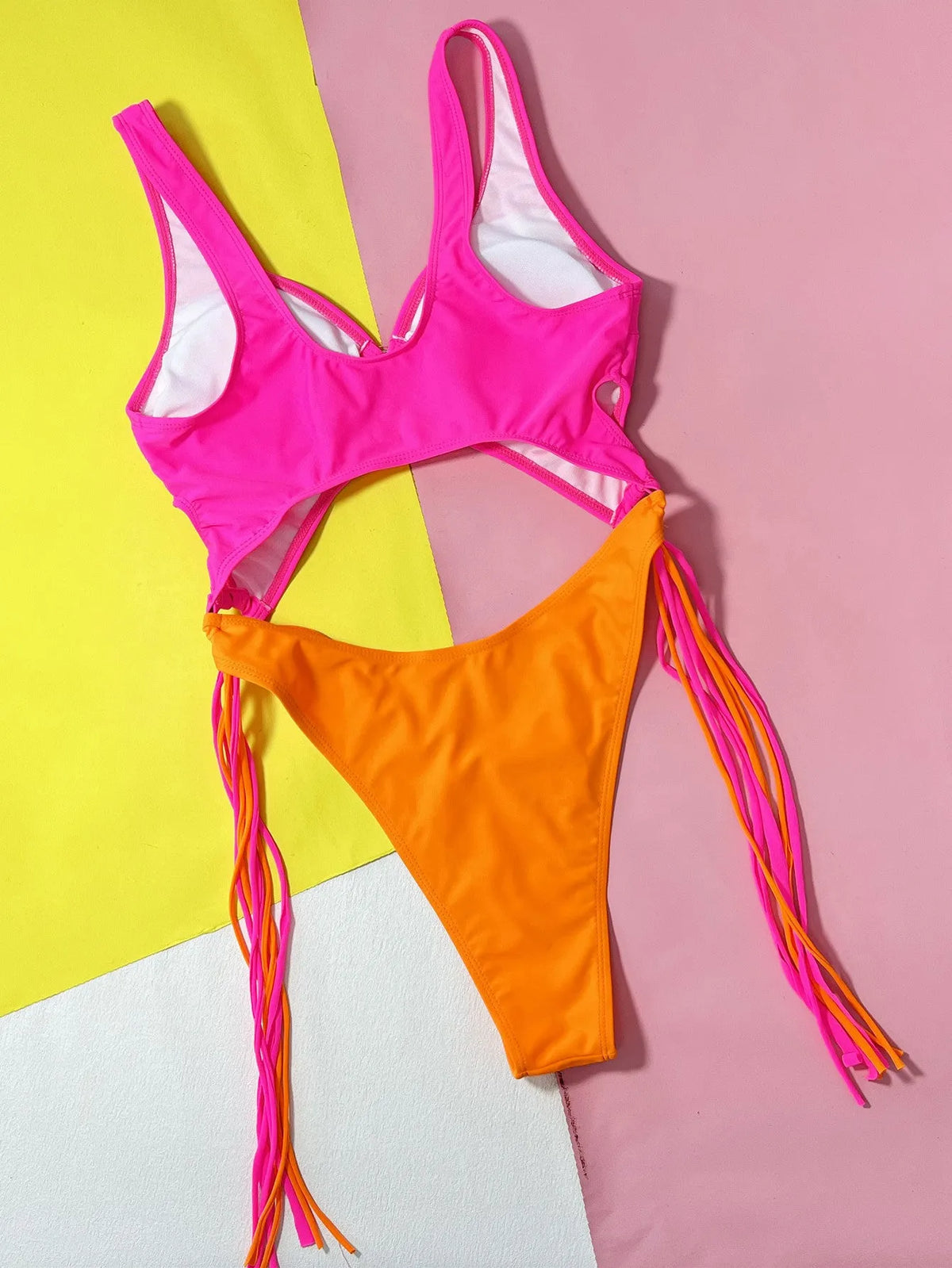 Women's one-piece hollow-out steel ring tassel swimsuit in rose red for swimming and wading