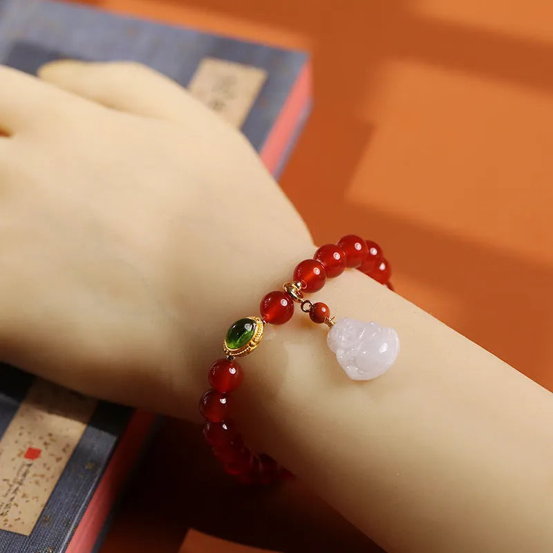 Red agate and amber women's bracelet with geometric Chinese design and hanging Maitreya Buddha charm