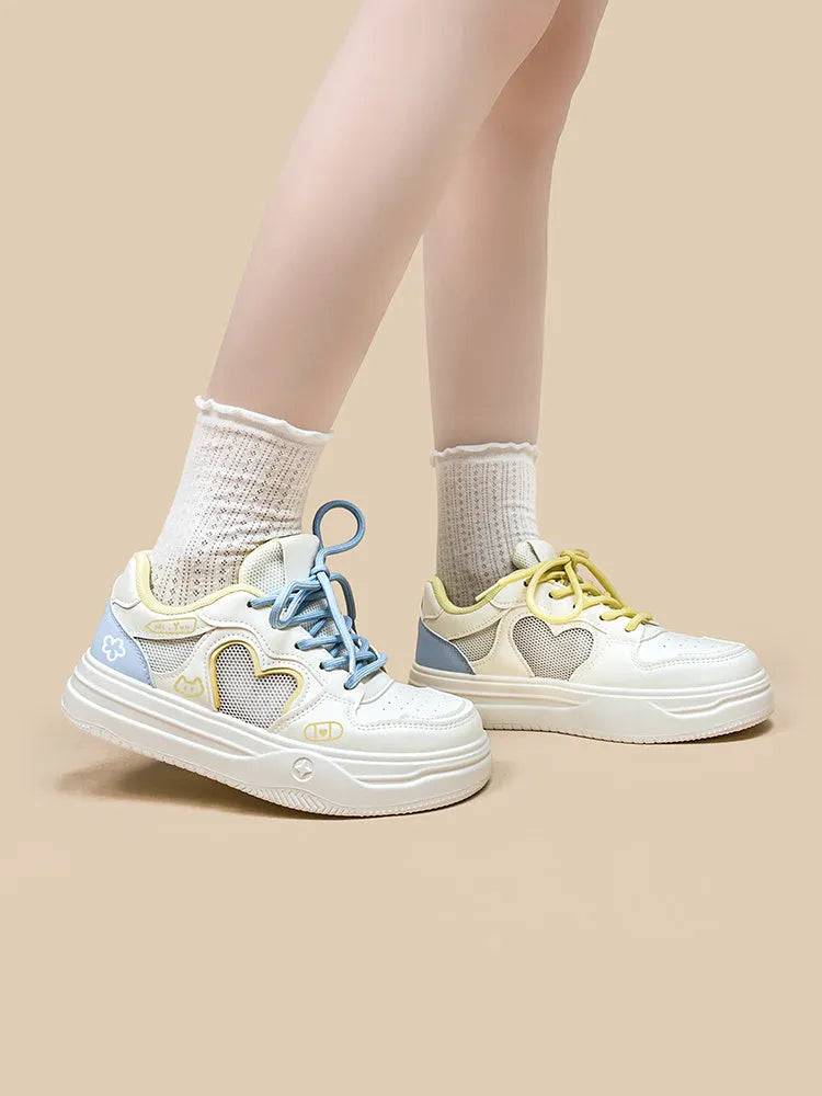 Women's mesh casual sneakers in Meow Rabbit Sea Salt Cheese colour with cross straps and rubber sole