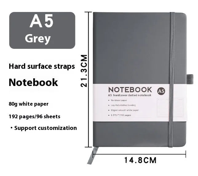 A5 size notebook with soft skin-feel PU leather cover and strap closure, open to show horizontal lined pages.