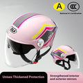 Light brown motorcycle half helmet with a dual mirrored visor on a table.