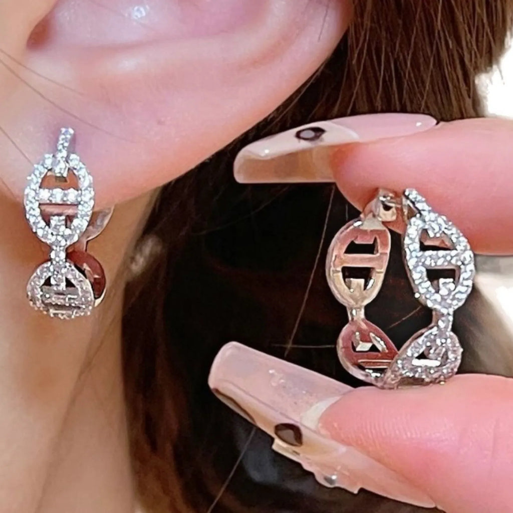 Ladies diamond design earrings in silver, gold, or rose gold finishes with thick gold plating on copper