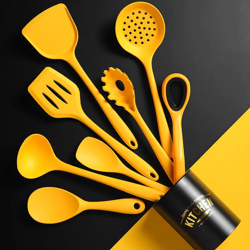 Yellow silicone and nylon 4-piece cooking utensil set with spoon and spatula for nonstick cookware