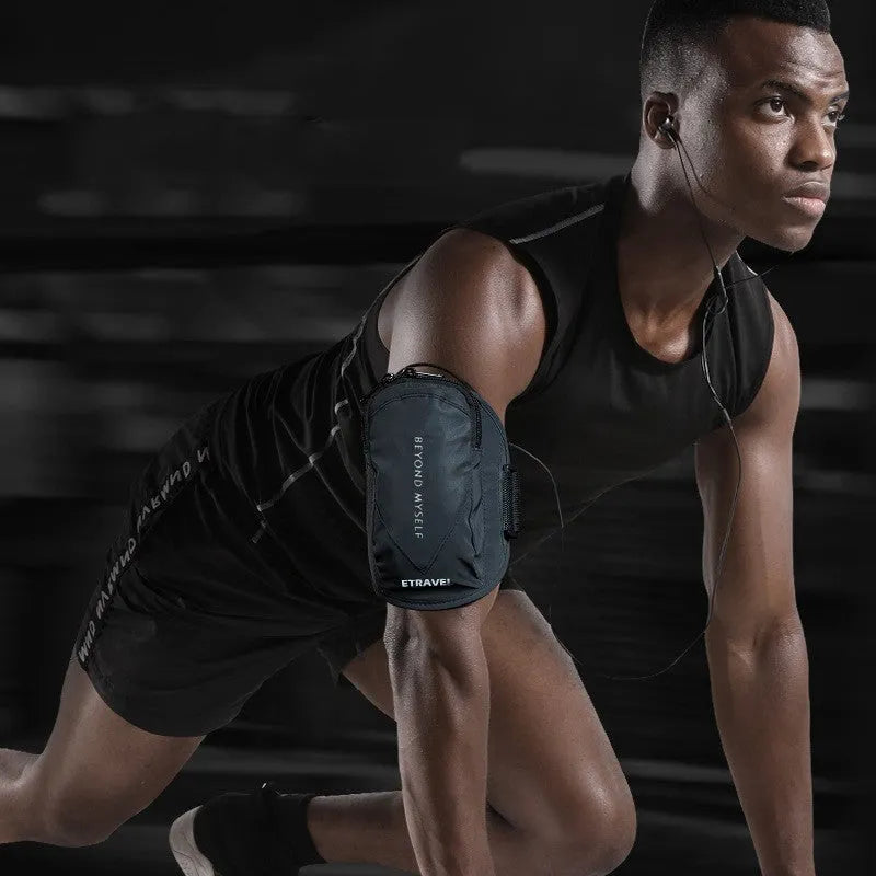 Black reflective running arm bag with adjustable strap, holding a mobile phone, shown on a runner's arm.