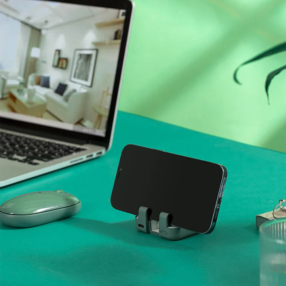 Multi-function bracket mobile power supply with dual cables and phone stand, 4000mAh, in green