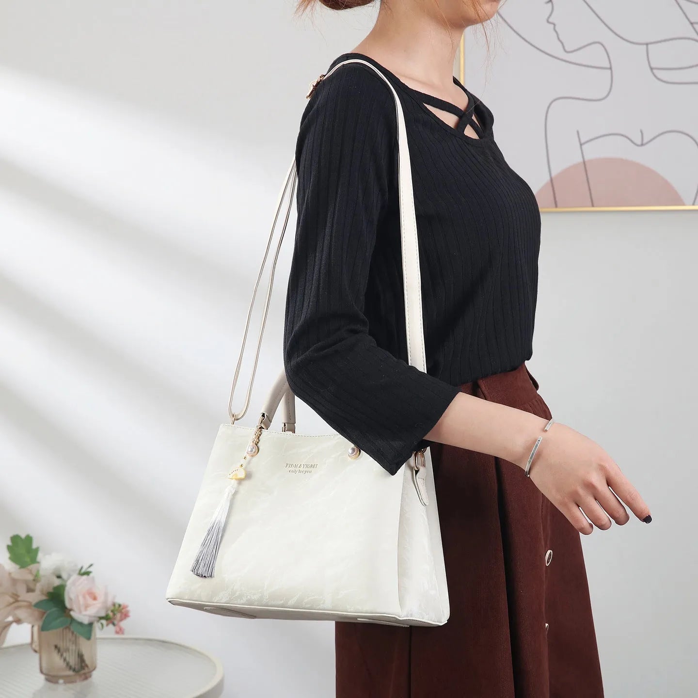 Women's PU leather shoulder bag with horizontal square shape and slit pockets in ethnic-style finish