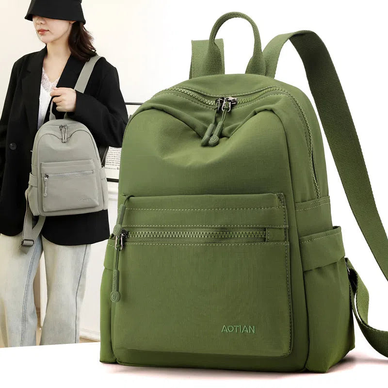 Women's Oxford cloth casual travel backpack in Classic Black with adjustable straps and casual design