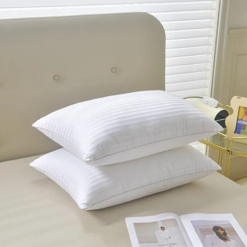 White cotton satin stripe pillow with a feather cotton fill, shown in low, medium, and high loft options.