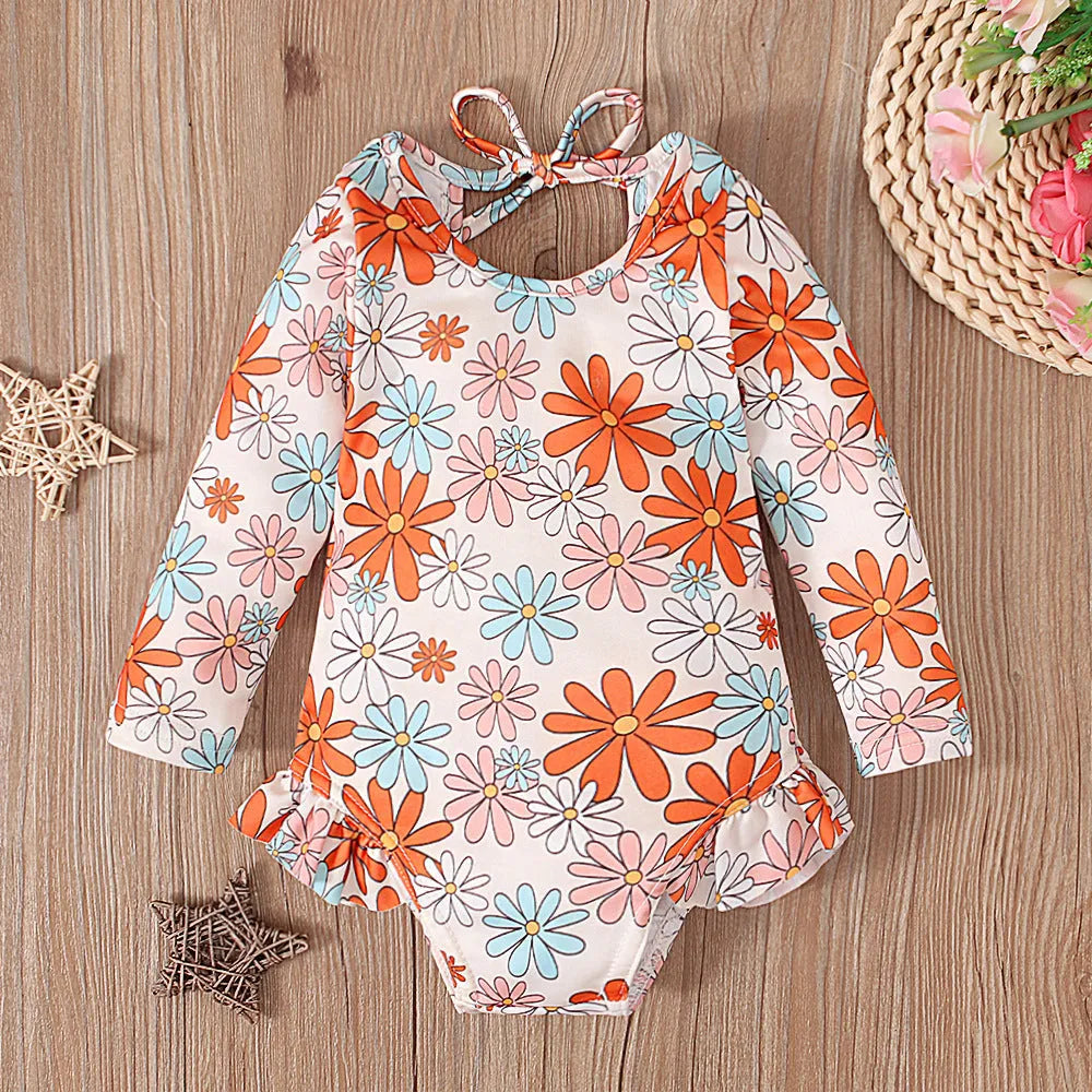 Girl's pattern graphic print crew neck open back swimsuit in orange red with flower design, polyester fabric
