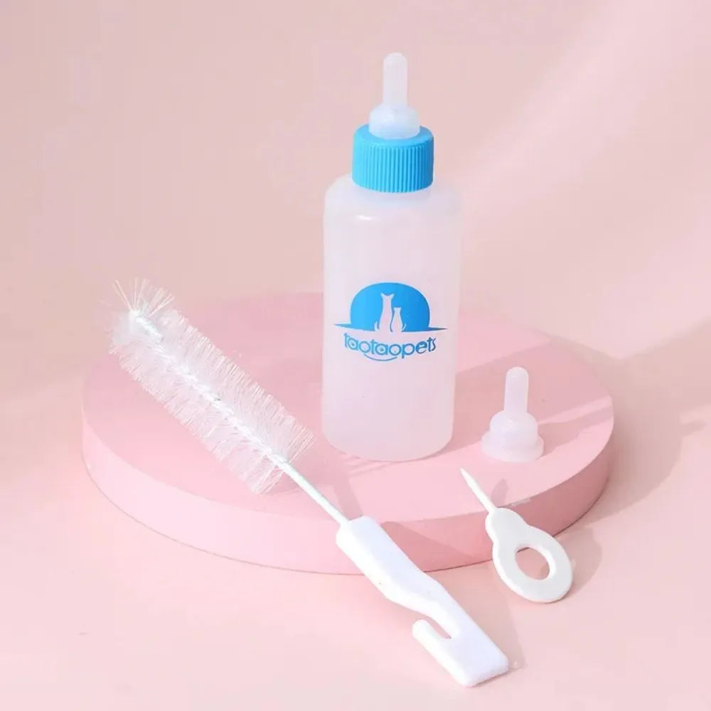 Four pet milk bottles in yellow, pink, blue, and green with a cleaning brush on a white background