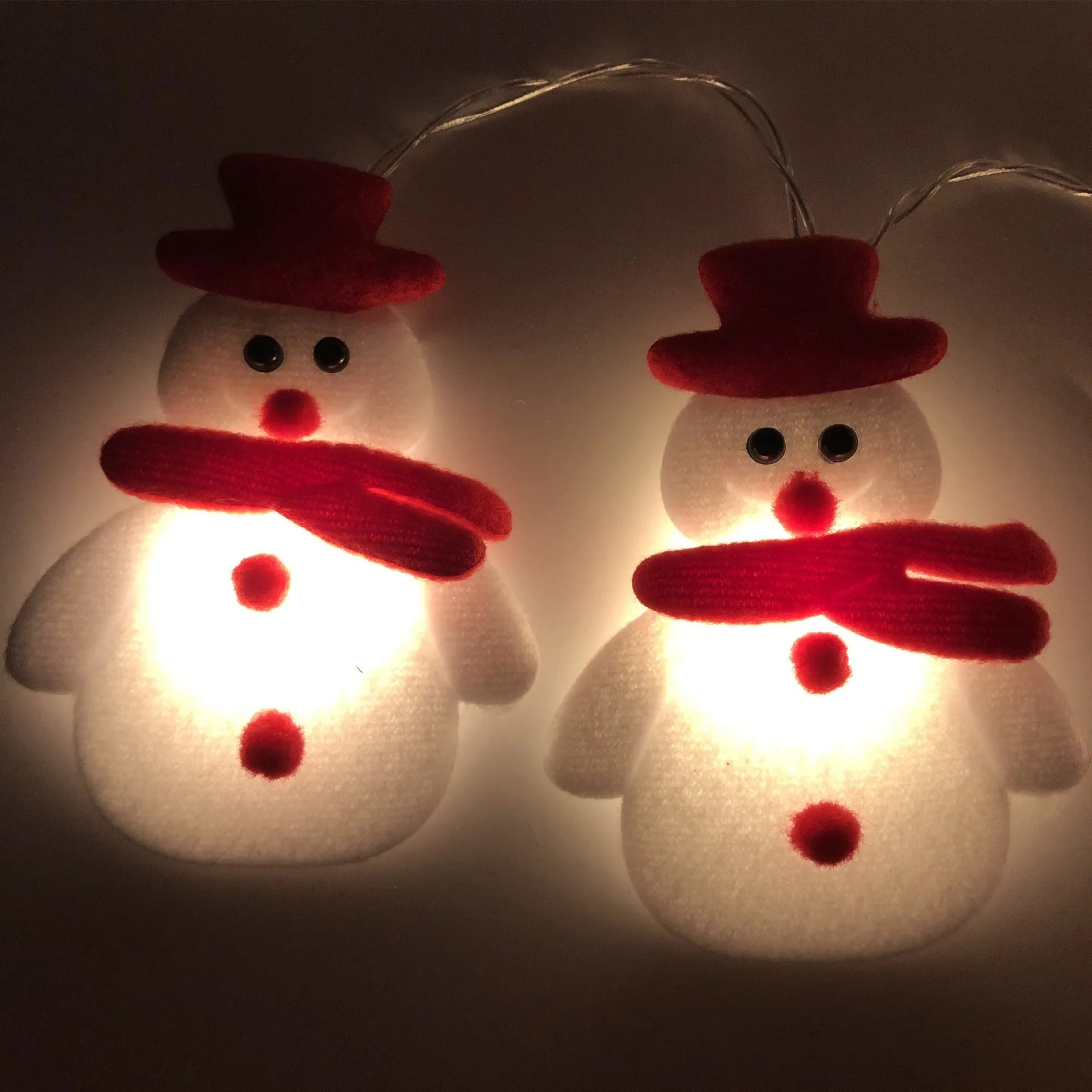 Christmas snowman LED string lights garland with warm white bulbs and character decorations