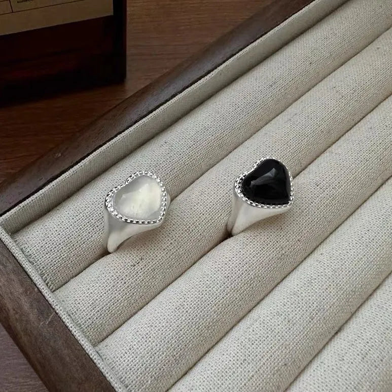 Adjustable sterling silver ring with heart-shaped black agate stone on open mouth design