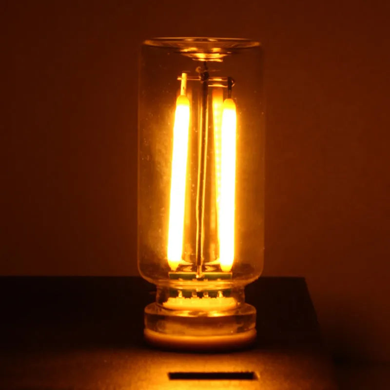 Transparent USB touch-controlled night lamp with compact 22x64mm glass construction