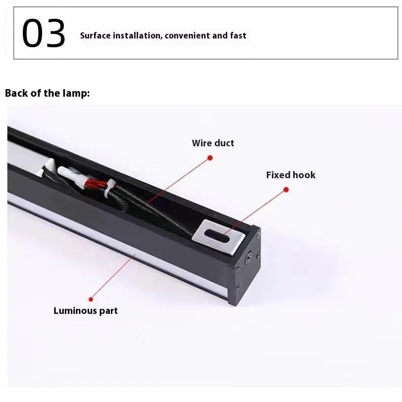 Black 80cm long aluminium LED strip wall lamp mounted on a wall with touch control for colour changing.