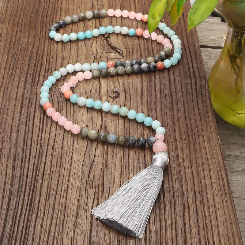 Bohemian 108 colour stone necklace with tassel pendant and matching bracelet on display