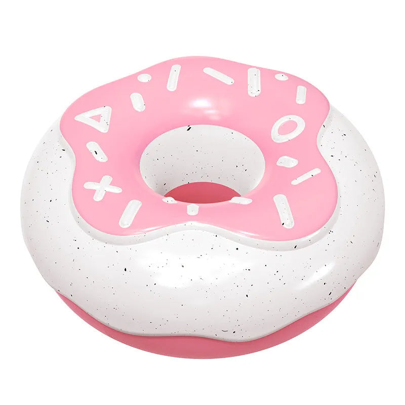 Pink, yellow, and chocolate coloured TPR donut dog toys with textured surfaces and a squeaker.