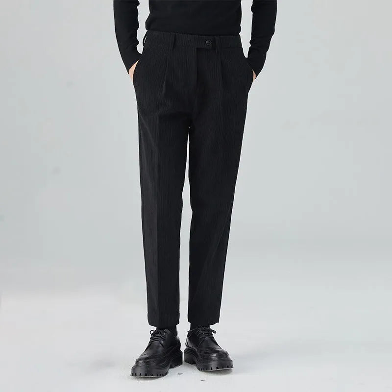 Men's straight-leg corduroy trousers in beige colour showing mid-waist design and loose fit