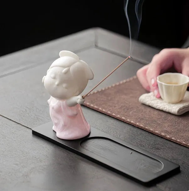 Ceramic little female court attendant figurine incense burner decoration in a floral pattern.