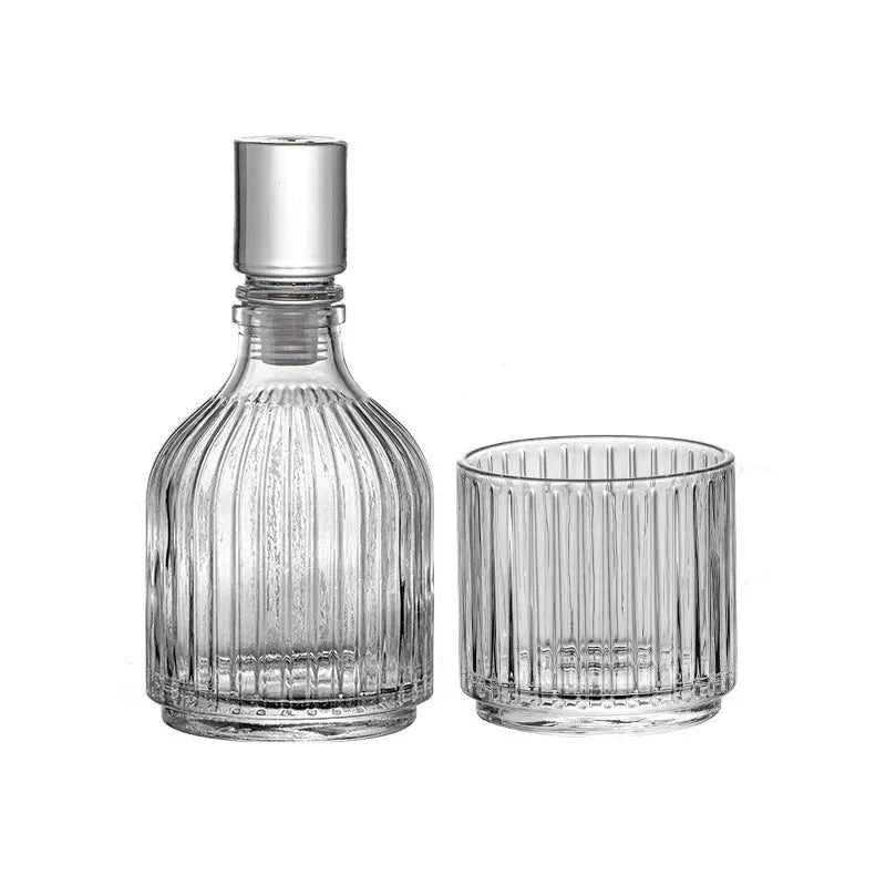 Clear glass whiskey wine glass with striped pattern on modern bar table