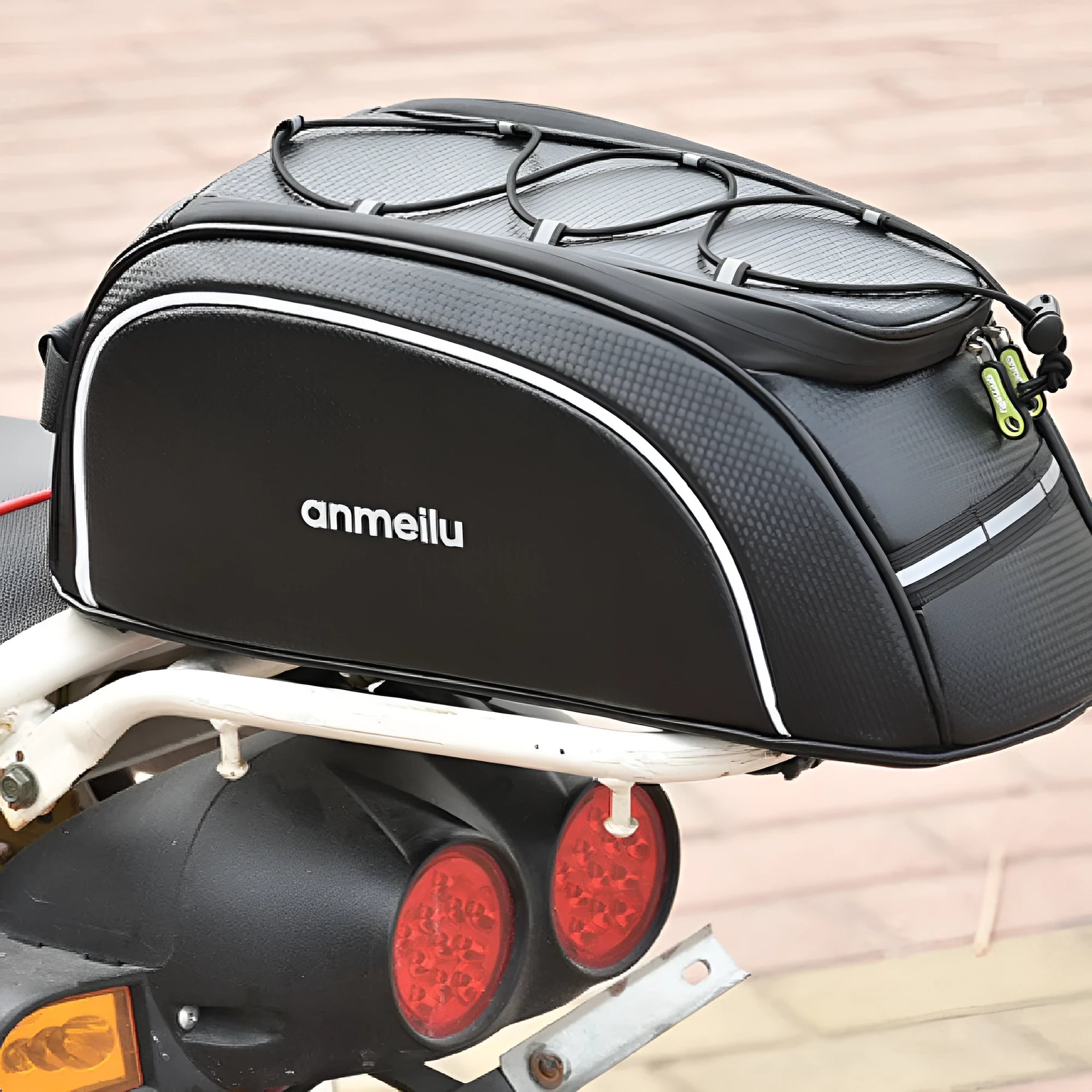 Waterproof black bicycle rack bag mounted on rear bicycle rack showing 8-litre capacity dimensions