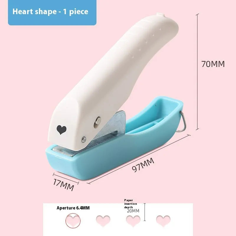 Manual hand punch with four embossing heads: Love, 4mm round, 6mm round, and star shapes.